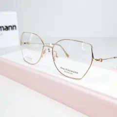 Eleganckie okulary Ana Hickmann. Złote, tytanowe oprawki. Zastanawiasz się nad uczulenie na okulary objawy? Te mogą być dobrym wyborem.